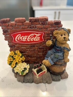 Coca-Cola Teddy Bear Figurine with Red Logo and Yellow Flowers